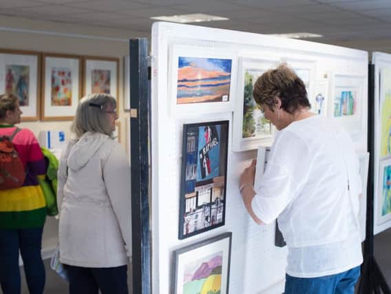 Visitors to the Chilterns MS Centre's art exhibition