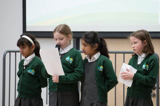 Green Ridge Primary Academy pupils speaking during the event about what they would like buried in the time capsule