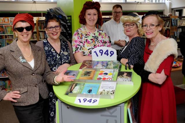 Buckingham Library 70th birthday celebrations. Library staff in 40s costumes. From the left, Sue Duhig, Pam Sirett, Glenys Armstrong, Alison Bone and Pam Gowen. PNL-190321-122536009