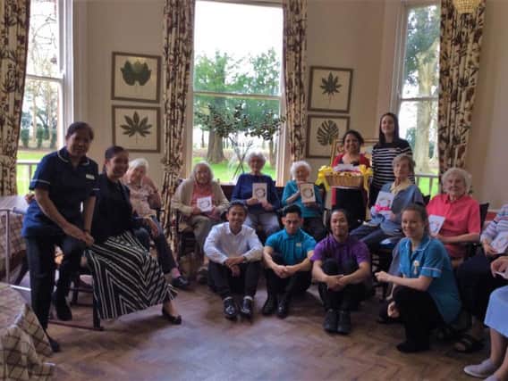 Residents at Bartlett's Residential Care Home in Stone with their new poetry book