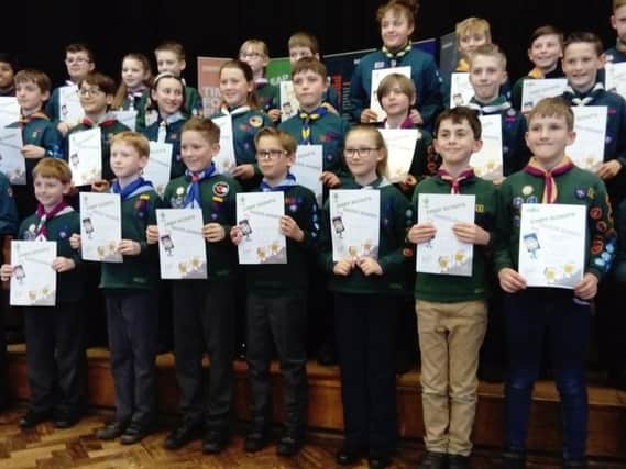 Scouts from across Bucks receive their awards at an event held at Aylesbury High School