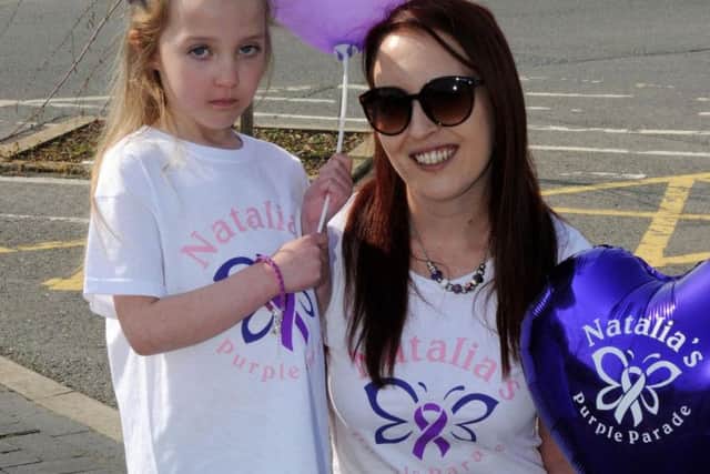 Natalia Barlow, five, with her mum Caz, organiser of the Purple Day walk
