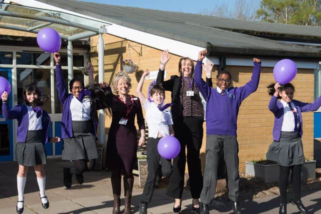 Bedgrove Junior School pupils jump for joy in celebration of the school becoming an academy