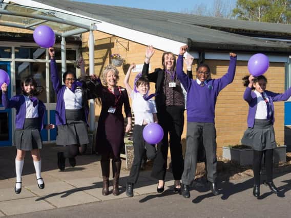 Bedgrove Junior School pupils jump for joy in celebration of the school becoming an academy