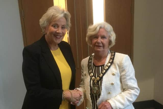 Aylesbury Vale District Council's outgoing chairman Sue Renshell hands over the reigns to new chair Judy Brandis (right)