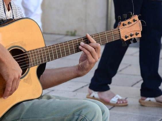 Library image of a busker performing