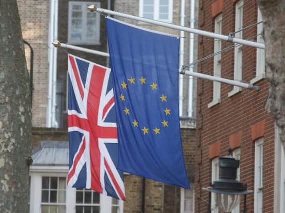 An EU flag flies next to the Union Jack