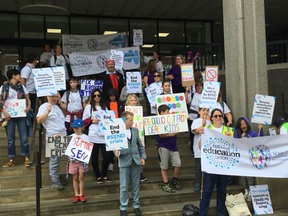 Protesters on the steps of County Hall in Aylesbury