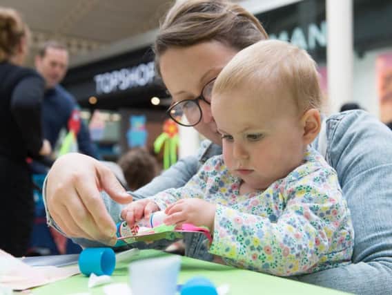 There was fun for everyone at the Friars Square family fete last week - here one-year-old Nina Nevin enjoys some crafty fun with her mum
