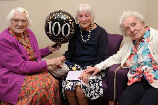 Nancy Pearce celebrates her 100th birthday at Avondale Care Home, Aylesbury. Nancy Pearce with sisters, Mary Johnson, 94, left and Sybil Logan, 95, right. PNL-190706-174225009