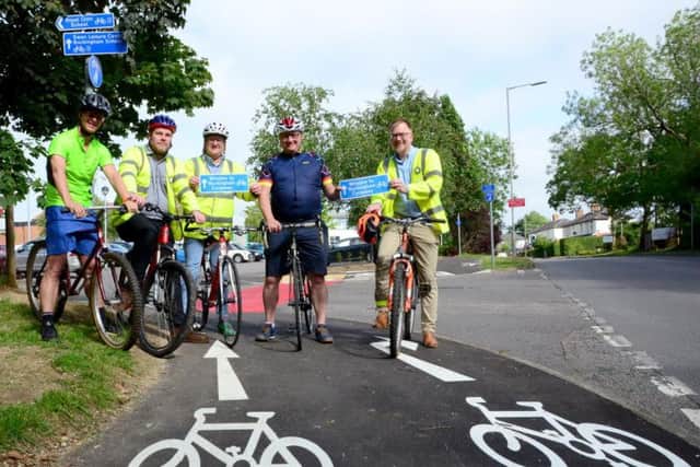 From left councillors Charlie Clare, Paul Irwin, Mark Shaw and Warren Whyte. In the blue is Bucks cycling champion Clive Harris officially opening the extension to the cycleway