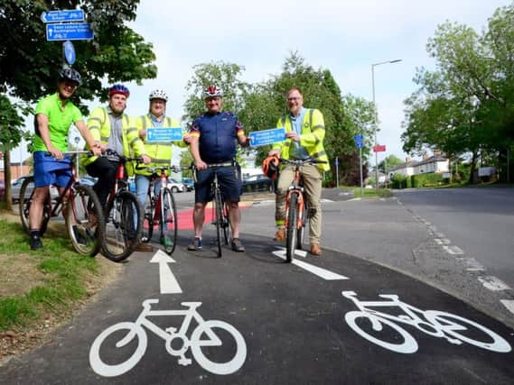From left councillors Charlie Clare, Paul Irwin, Mark Shaw and Warren Whyte. In the blue is Bucks cycling champion Clive Harris officially opening the extension to the cycleway
