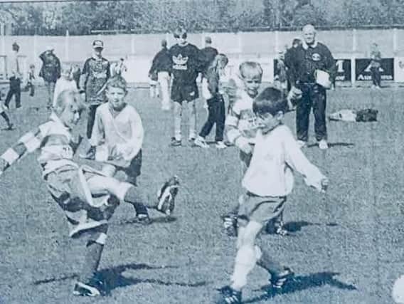 Ellen White (r), showing the boys how it's done at a football open day back in 1997