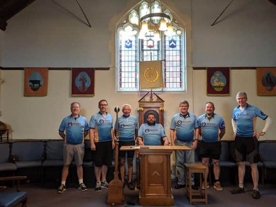 The Freemasons cycling team pictured inside the Aylesbury masonic centre