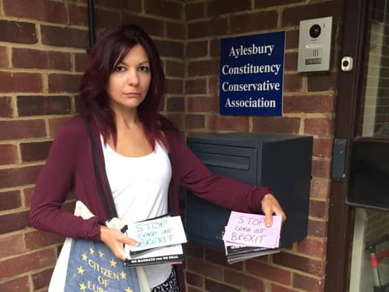 Anti-Brexit campaigner Sarah Jones delivers messages from Aylesbury residents to David Lidington's constituency office