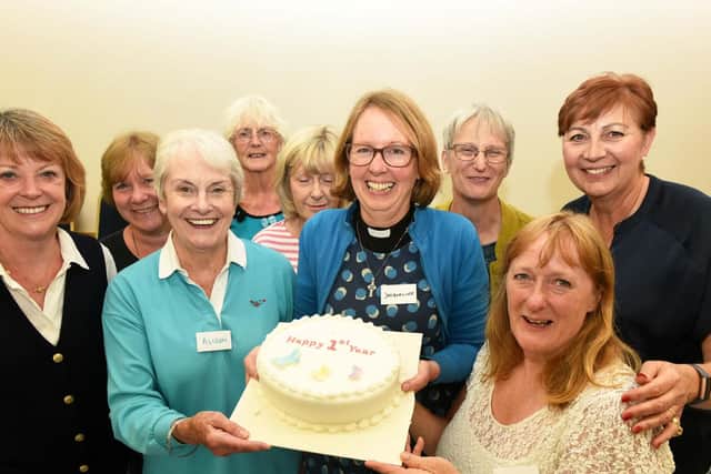 Isla St Clair (far left) helps Cafe Zest celebrate its first anniversary