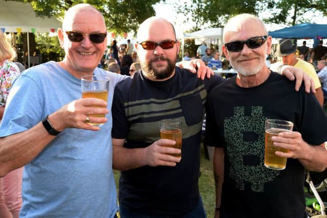 East and Botolph Claydon Beer Festival. Happy beer drinkers.