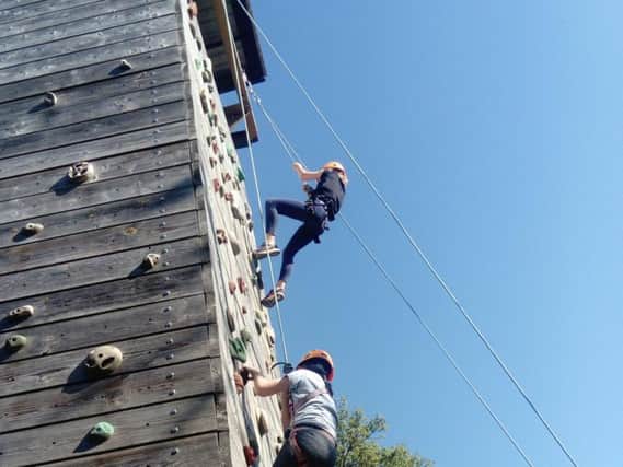 The climbing wall was among the adventurous activities at Cosgrove