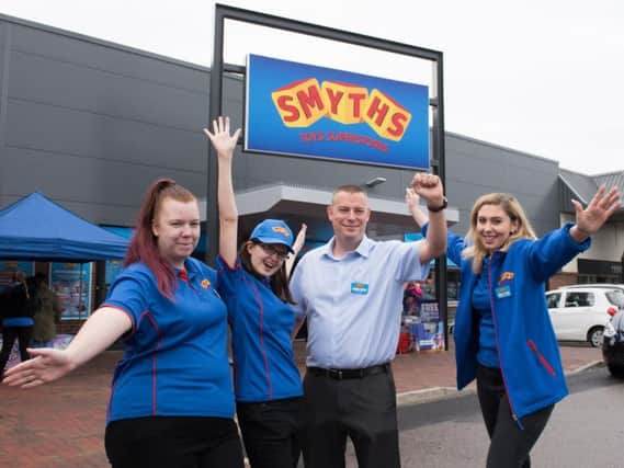 Manager Andy Norman with staff on the opening day