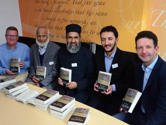 Mark Shaw and Gareth Williams with the Imam and Chesham mosque members