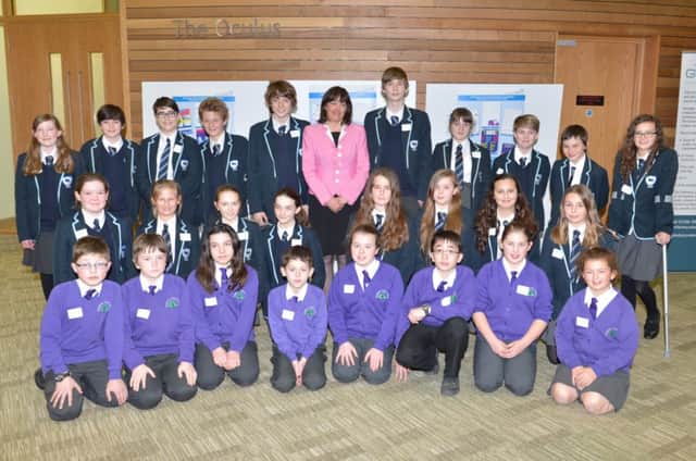 NHS Aylesbury Vale schools competition awards ceremony held at AVDC offices - pictured are pupils from the Sir Thomas Fremantle School and Bedgrove Junior School with Louise Patten - chief officer of Aylesbury Vale Clinical Commissioning Group