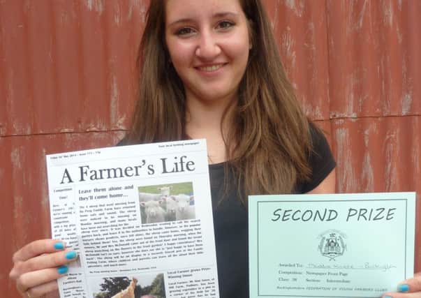 Buckingham young farmer Maddie Kimble who came second in the 'newspaper front page' competition at Bledlow Country Show