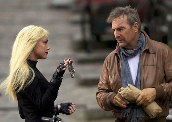 Amber Heard and Kevin Costner in 3 Days To Kill