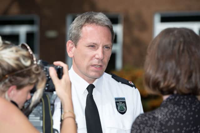 Police press conference regarding historic child sex offences held at Aylesbury Police Station - pictured is Olly Wright talking to the Bucks Herald