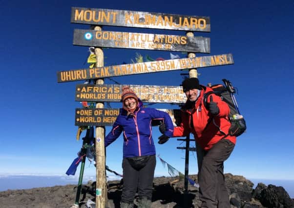 Sarah Williams-Gardener with husband Richard at the peak of Mount Kilimanjaro