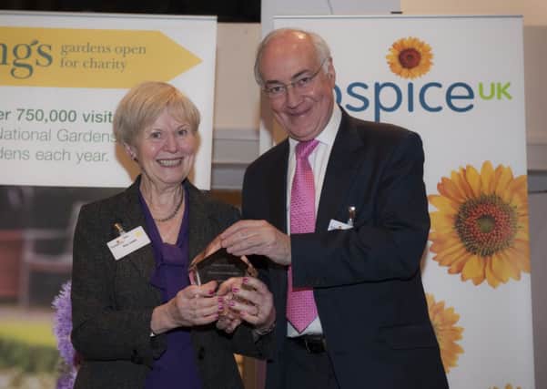 Hospice of St Francis volunteer Kay Lewis is recognised for 21 years of giving back.