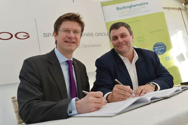 Greg Clark MP visits Westcott Venture Park to sign Growth Deal Agreement. Greg Clark MP, left, and Alex Pratt OBE, BTVLEP, signing. PNL-150901-135650009