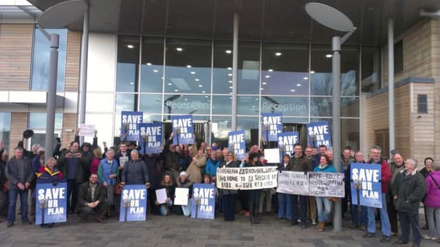 Campaigners against a proposed homes development in Haddenham protest outside Aylesbury Vale District Council offices ahead of the meeting