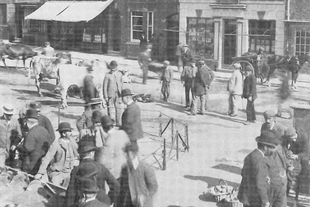 Winslow market: early 20th century scene