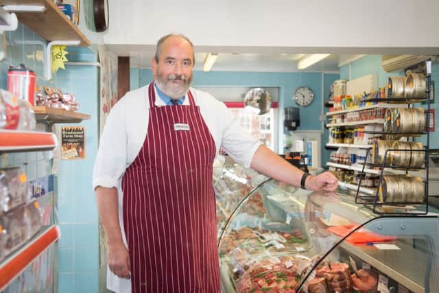 Butcher Simon Parminter - who is retiring - pictured at his shop in Haddenham PNL-150316-161002009