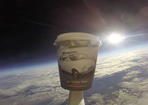 The Little Italy coffee cup rose to 1,005ft above the Earth on a weather balloon, before it burst and began freefalling at speeds of 150mph