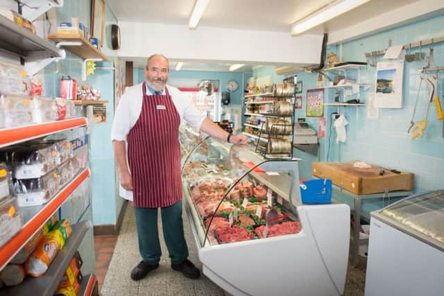 Butcher Simon Parminter - who is retiring - pictured at his shop in Haddenham PNL-150316-160937009