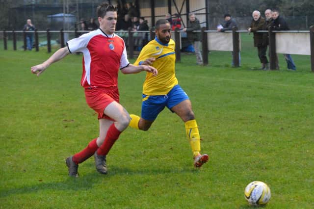 Jason Costello, pictured against Stony Stratford earlier in the season, bagged the winner in Tuesdays clash between the two