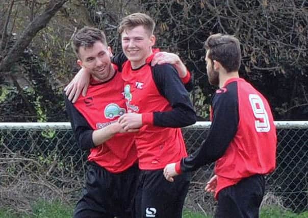 The Tring players celebrate
