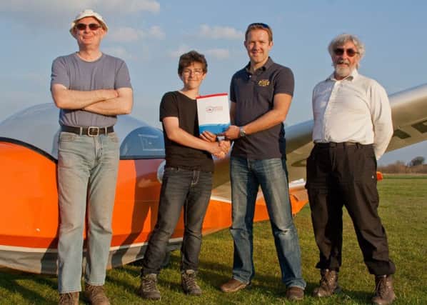 From left to right: Peter Concannon, Olivers flying instructor, Oliver Dudley-Heidkamp, Andrew Perkins, deputy chairman of the British Gliding Association and Mike Clark, chief flying instructor