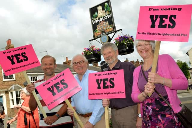 The Yes4Winslow group in High Street. From the left, Vic Otter, Llew Monger, Roy van de Poll and Gaynor Richmond