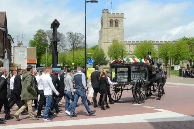 The horse and carriage hearse arrived at All Saints Church