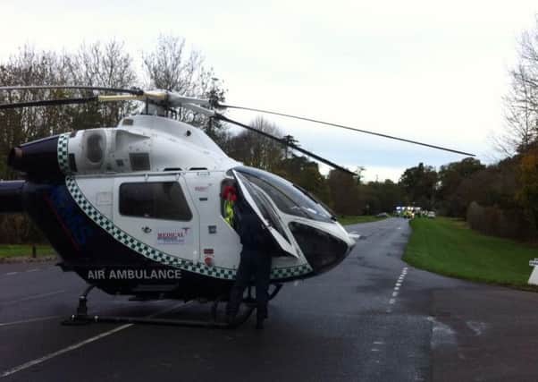 An air ambulance landing outside Mentmore Golf Club after an accident on the road between Mentmore and Cheddington