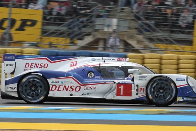 Anthony Davidson exits the Dunlop Chicane in the number 1 Toyota at Le Mans on Wednesday