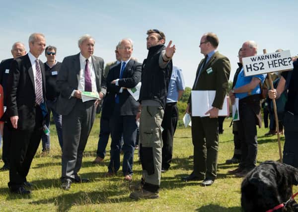 The HS2 select committee visits Coombe Hill to see where the route will cut through the Vale - pictured is Joe Mayled - Chiltern Countryside Ranger talking through the sites of interest