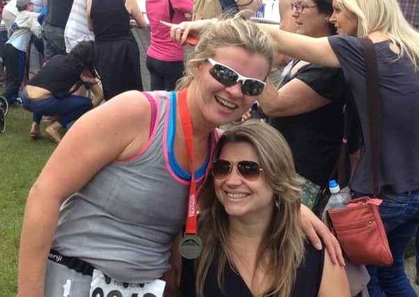 Lucy O'Hare, left, completed a triathlon to raise money in aid of a US charity which is researching into her friend Annabelle Moult's (left) condition