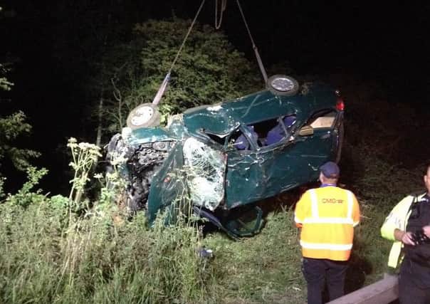 Car overturned off the M1 northbound