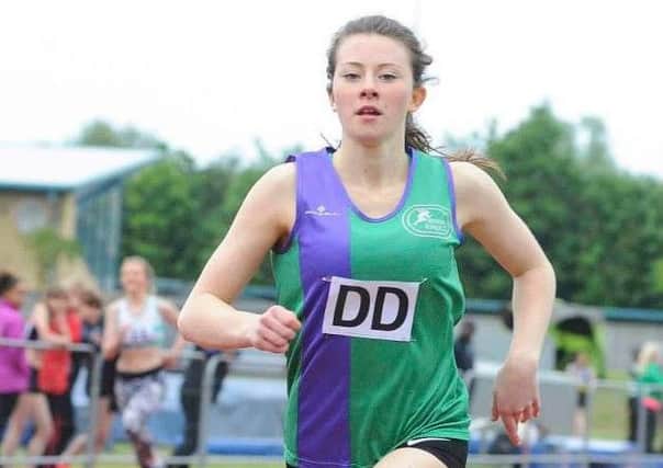 Amber Carroll in action for Dacorum & Tring AC