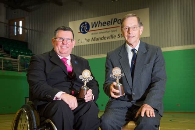 Wheelpower's chief executive Martin McElhatton recives the Master Wheelwrights award - pictured with him his Roger Jefcoate, also with the same award PNL-150807-160355009