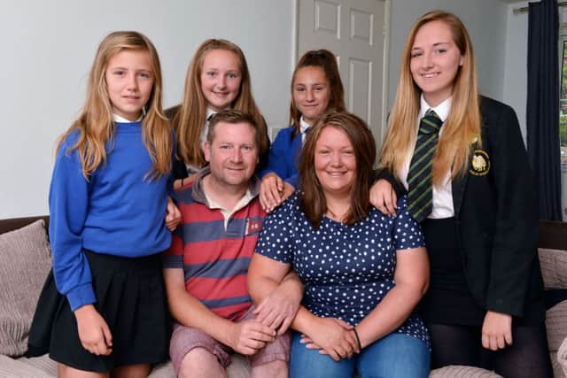 Laura and Darren Walker from Calvert Green are getting married after Darren's heart problems. Darren and Laura with daughters from the left, Grace, Hannah, Erin and Ellie-Rose