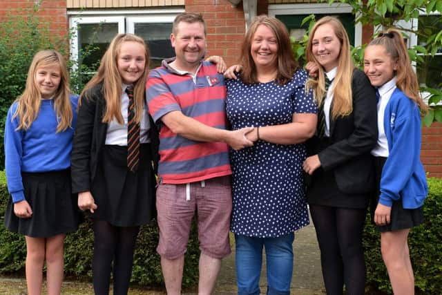 Laura and Darren Walker from Calvert Green are getting married after Darren's heart problems. Darren and Laura with daughters, from the left, Grace, Hannah, Ellie-Rose and Erin